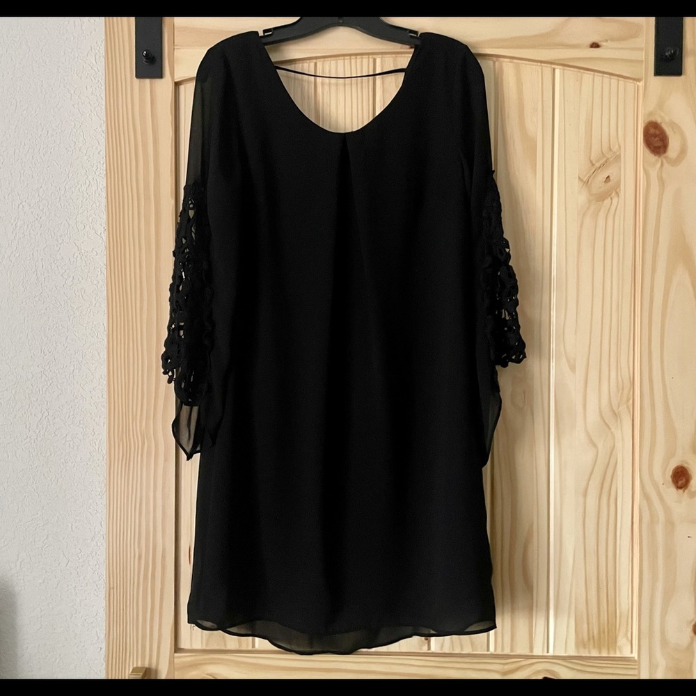 A. Byer dress with lace sleeves